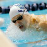 Woodinville senior Alex Popov takes the final turn in the 100 yard breaststroke consolation at the 4A WIAA Boys High School Swim and Dive Championships on Friday, Feb. 18, 2023, at the Weyerhaeuser King County Aquatic Center in Federal Way, Washington. (Ryan Berry / The Herald)