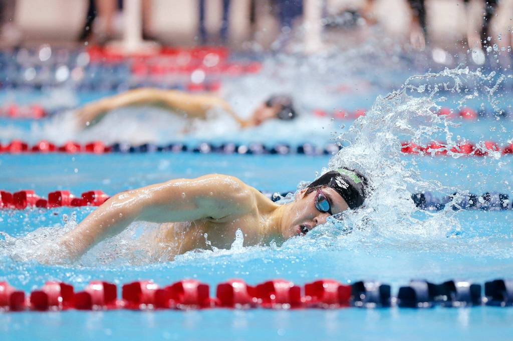 Jackson junior Ethan Georgiev races to a 4th-place finish in the 200 yard freestyle final at the 4A WIAA Boys High School Swim and Dive Championships on Friday, Feb. 18, 2023, at the Weyerhaeuser King County Aquatic Center in Federal Way, Washington. (Ryan Berry / The Herald)