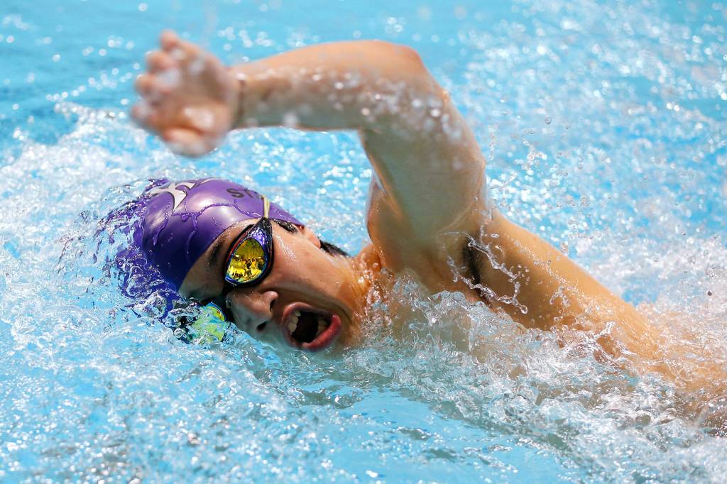 Kamiak junior Bryan Wong competes in the 500 yard freestyle consolation at the 4A WIAA Boys High School Swim and Dive Championships on Friday, Feb. 18, 2023, at the Weyerhaeuser King County Aquatic Center in Federal Way, Washington. (Ryan Berry / The Herald)