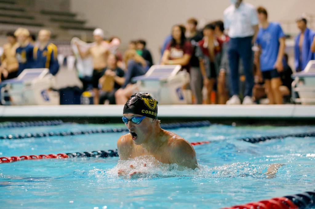 Shorecrest senior Finn Corbin swims in the 100 yard breast stroke consolation at the 3A WIAA Boys High School Swim and Dive Championships on Friday, Feb. 18, 2023, at the Weyerhaeuser King County Aquatic Center in Federal Way, Washington. (Ryan Berry / The Herald)