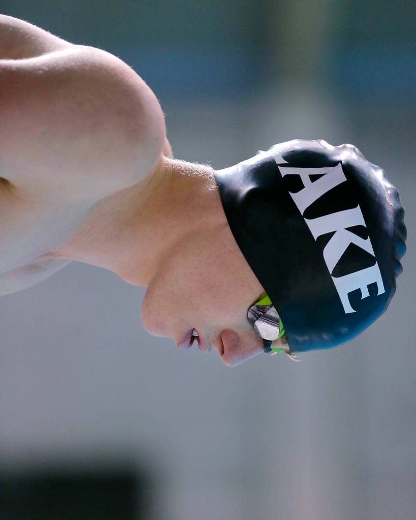 Lake Stevens senior Laird Marlatt prepares to dive in before the 100 yard freestyle consolation race at the 4A WIAA Boys High School Swim and Dive Championships on Friday, Feb. 18, 2023, at the Weyerhaeuser King County Aquatic Center in Federal Way, Washington. (Ryan Berry / The Herald)