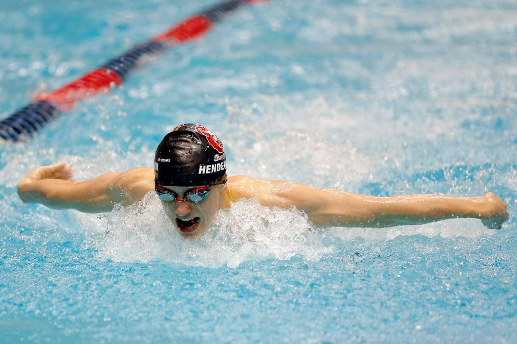 Cascade senior Noah Henderson swims in the 200 yard individual medley consolation at the 3A WIAA Boys High School Swim and Dive Championships on Friday, Feb. 18, 2023, at the Weyerhaeuser King County Aquatic Center in Federal Way, Washington. (Ryan Berry / The Herald)
