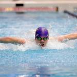 Lake Stevens sophomore Camden Blevins-Mohr swims in the consolation race for the 100 yard butterfly at the 4A WIAA Boys High School Swim and Dive Championships on Friday, Feb. 18, 2023, at the Weyerhaeuser King County Aquatic Center in Federal Way, Washington. (Ryan Berry / The Herald)
