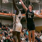 Mountlake Terraces Zaveon Jones makes a layup during the game against Arlington on Saturday, Feb. 18, 2023 in Everett, Washington. (Olivia Vanni / The Herald)