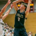 Arlingtons Leyton Martin attempts a layup during the game against Mountlake Terrace on Saturday, Feb. 18, 2023 in Everett, Washington. (Olivia Vanni / The Herald)