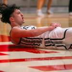 Mountlake Terraces Logan Tews reacts to drawing a foul call during the game against Arlington on Saturday, Feb. 18, 2023 in Everett, Washington. (Olivia Vanni / The Herald)