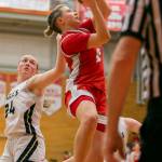 Stanwoods Grace Walker attempts a layup during the game against Arlington on Saturday, Feb. 18, 2023 in Everett, Washington. (Olivia Vanni / The Herald)