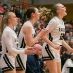 Arlingtons Kierra Reese yells in reaction to a score by a teammate during the game against Stanwood on Saturday, Feb. 18, 2023 in Everett, Washington. (Olivia Vanni / The Herald)