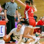 Arlingtons Maddy Fischer is fouled during the game against Stanwood on Saturday, Feb. 18, 2023 in Everett, Washington. (Olivia Vanni / The Herald)