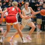 Arlingtons Jenna Villa runs a play during the game against Stanwood on Saturday, Feb. 18, 2023 in Everett, Washington. (Olivia Vanni / The Herald)