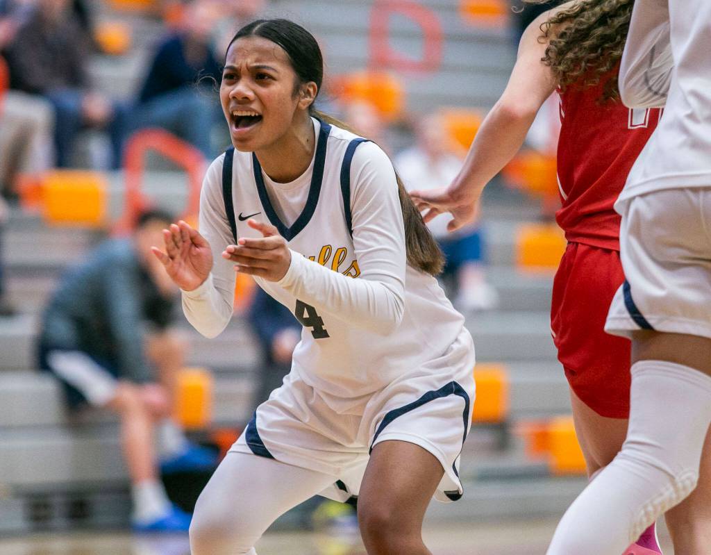 Everetts Mylie Wugumgeg reacts to a teammate scoring during the game against Snohomish on Saturday, Feb. 18, 2023 in Everett, Washington. (Olivia Vanni / The Herald)