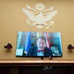 FILE - Food and Drug Administration Commissioner Robert Califf testifies via video during a House Commerce Oversight and Investigations subcommittee hybrid hearing on the nationwide baby formula shortage on Wednesday, May 25, 2022, in Washington. Califf has spent much of his last year on the job warning that growing “distortions and half-truths” surrounding vaccines and other medical products are a major driver of sickness and death in America. (AP Photo/Kevin Wolf, File)