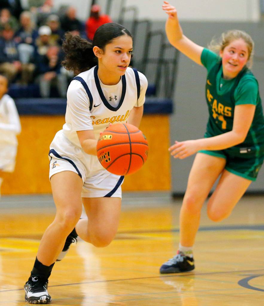 Everetts Selena Espinoza takes a steal the other way against Bishop Blanchet during a first round playoff game on Tuesday, Feb. 21, 2023, at the Norm Lowery Gymnasium in Everett, Washington. (Ryan Berry / The Herald)