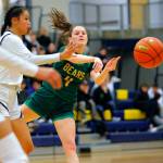 Bishop Blanchets Sadie Graves passes the ball against Everett during a first round playoff game on Tuesday, Feb. 21, 2023, at the Norm Lowery Gymnasium in Everett, Washington. (Ryan Berry / The Herald)