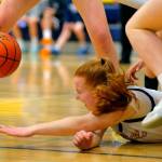 Everetts Annabelle Lawless hits the ground while trying to secure an offensive rebound against Bishop Blanchet during a first round playoff game on Tuesday, Feb. 21, 2023, at the Norm Lowery Gymnasium in Everett, Washington. (Ryan Berry / The Herald)