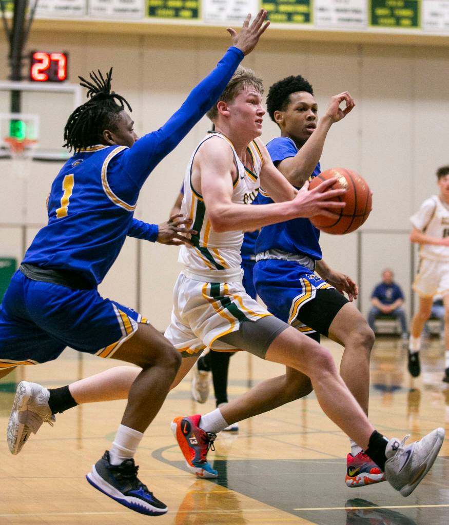Shorecrests Anthony Najera drives to the hoop during the game against Stadium on Tuesday, Feb. 21, 2023 in Shoreline, Washington. (Olivia Vanni / The Herald)