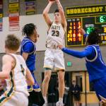 Shorecrests Parker Baumann attempts a three-point shot during the game against Stadium on Tuesday, Feb. 21, 2023 in Shoreline, Washington. (Olivia Vanni / The Herald)