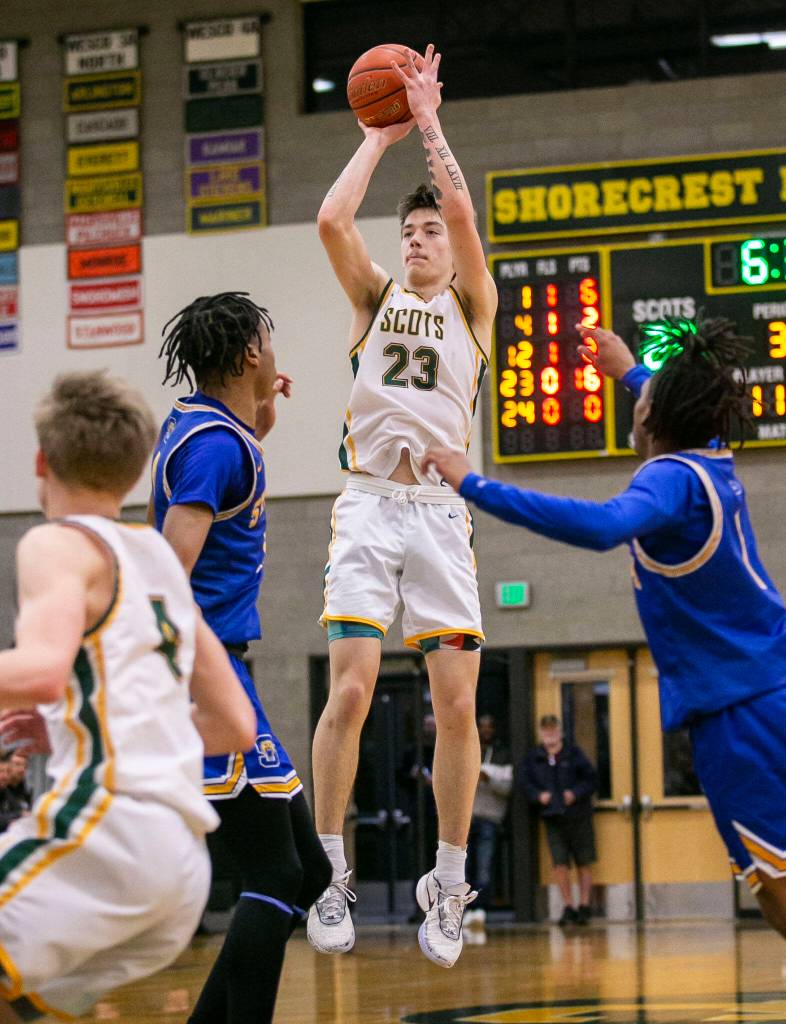 Shorecrests Parker Baumann attempts a three-point shot during the game against Stadium on Tuesday, Feb. 21, 2023 in Shoreline, Washington. (Olivia Vanni / The Herald)