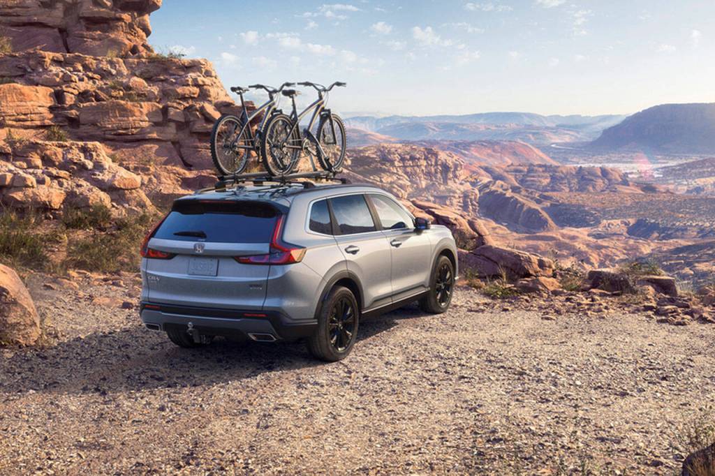 The 2023 Honda CR-V hybrid Sport Touring model, shown here, comes standard with all-wheel drive. (Honda)