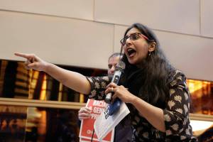 Seattle Council Member Kshama Sawant speaks to supporters and opponents of a proposed ordinance to add caste to Seattle's anti-discrimination laws at a rally at Seattle City Hall, Tuesday, Feb. 21, 2023, in Seattle. Sawant proposed the ordinance. (AP Photo/John Froschauer)