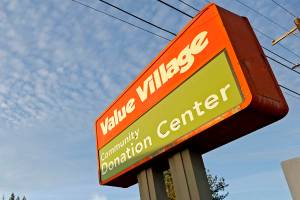 A Value Village store is seen Tuesday, Dec. 12, 2017, in Edmonds, Wash. The company that operates 300 Value Village, Savers and other thrift stores in the U.S., Canada and Australia is suing Washington state Attorney General Bob Ferguson, saying his office has violated its rights by demanding $3.2 million to settle a three-year investigation. (AP Photo/Elaine Thompson)