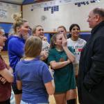 Sultan boys head basketball coach Nate Trichler (right) speaks to the girls basketball team during a practice at Sultan High School on Thursday. (Annie Barker / The Herald)
