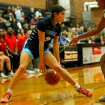 Meadowdale’s Gia Powell tries to cross up a defender against Mountlake Terrace on Wednesday, Jan.11, 2023, at Mountlake Terrace High School in Mountlake Terrace, Washington. (Ryan Berry / The Herald)