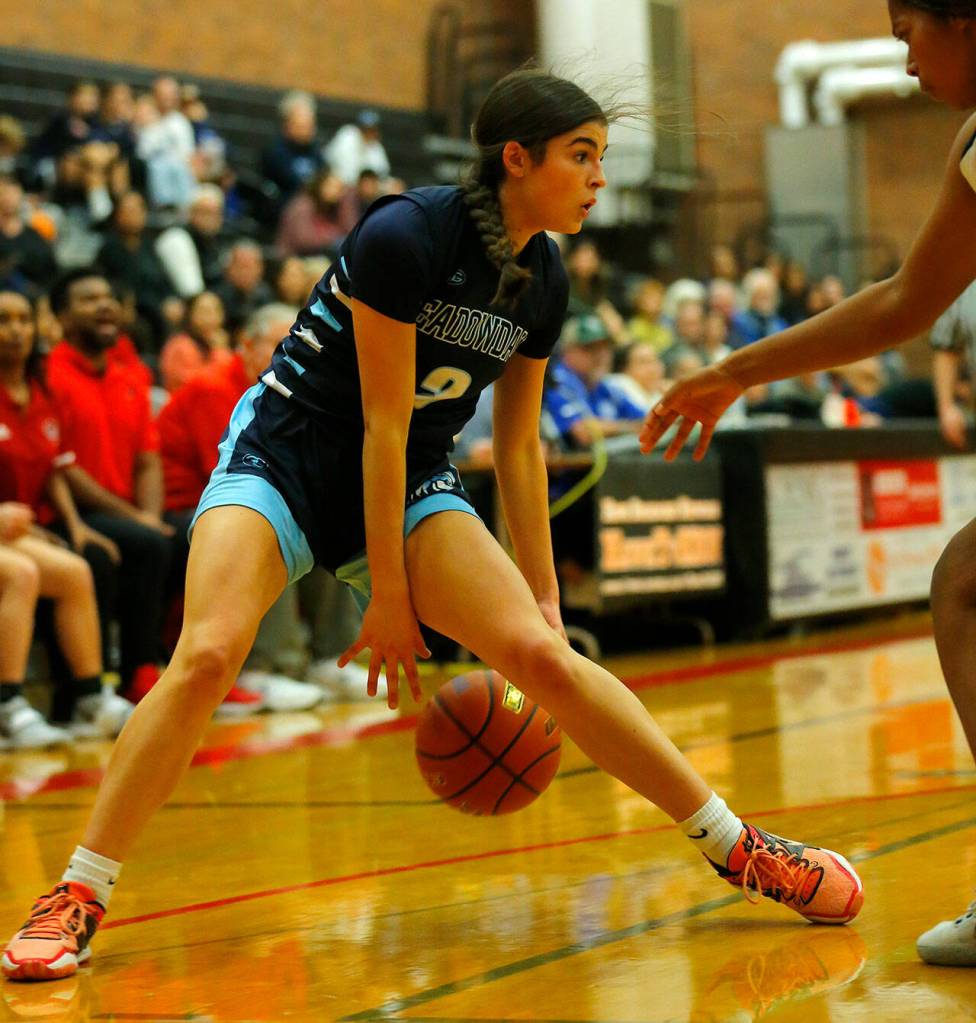 Meadowdale’s Gia Powell tries to cross up a defender against Mountlake Terrace on Wednesday, Jan.11, 2023, at Mountlake Terrace High School in Mountlake Terrace, Washington. (Ryan Berry / The Herald)