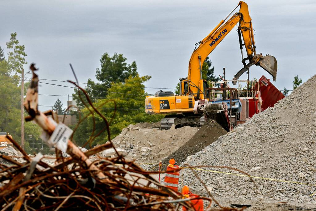 Construction at the site of the former Kmart for the Four Corners Apartments on September 14, 2021, in Everett, Washington. (Kevin Clark / The Herald)