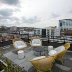 The rooftop at the Nimbus Apartments overlooks downtown and the waterfront Wednesday in downtown Everett. (Ryan Berry / The Herald)