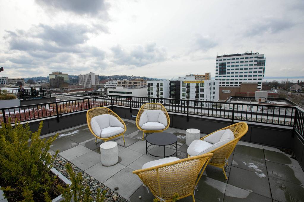 The rooftop at the Nimbus Apartments overlooks downtown and the waterfront Wednesday in downtown Everett. (Ryan Berry / The Herald)