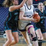 Meadowdales Mackenzie Tindall (33) moves with the ball during a 3A girls game in the Hardwood Classic between Meadowdale and Bonney Lake at the Tacoma Dome in Tacoma, Washington on Wednesday, March 1, 2023. Meadowdale won, 62-35.(Annie Barker / The Herald)