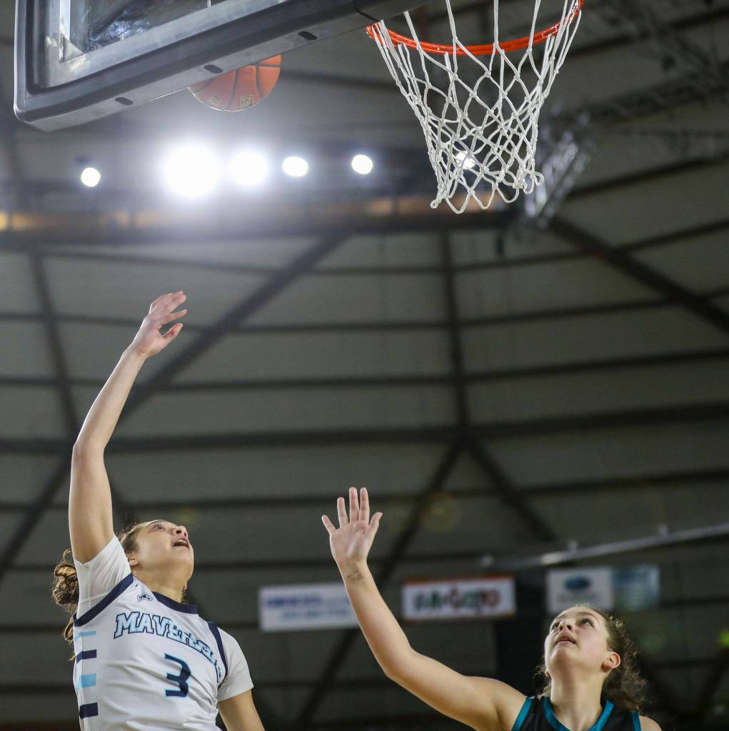 Meadowdales Kaiya Dotter (3) shoots the ball during a 3A girls game in the Hardwood Classic between Meadowdale and Bonney Lake at the Tacoma Dome in Tacoma, Washington on Wednesday, March 1, 2023. Meadowdale won, 62-35.(Annie Barker / The Herald)