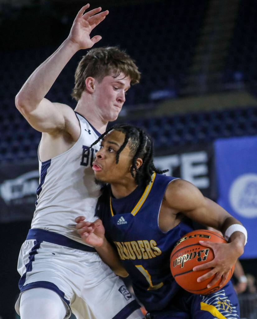 Mariners Jailin Johnson (2) fights to shoot the ball during a 3A boys game in the Hardwood Classic between Gonzaga Prep and Mariner at the Tacoma Dome in Tacoma, Washington on Wednesday, March 1, 2023. The Marauders fell, 79-69. (Annie Barker / The Herald)