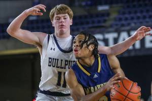 Mariner’s Jailin Johnson (2) fights to shoot the ball during a 3A boys game in the Hardwood Classic between Gonzaga Prep and Mariner at the Tacoma Dome in Tacoma, Washington on Wednesday, March 1, 2023. The Marauders fell, 79-69. (Annie Barker / The Herald)