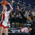 Stanwoods Tatum Brager (11) shoots a three during a 3A girls game in the Hardwood Classic between Lynnwood and Stanwood at the Tacoma Dome in Tacoma, Washington on Wednesday, March 1, 2023. Stanwood won, 74-69. (Annie Barker / The Herald)