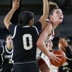 Stanwoods Vivienne Berrett (53) shoots the ball during a 3A girls game in the Hardwood Classic between Lynnwood and Stanwood at the Tacoma Dome in Tacoma, Washington on Wednesday, March 1, 2023. Stanwood won, 74-69. (Annie Barker / The Herald)