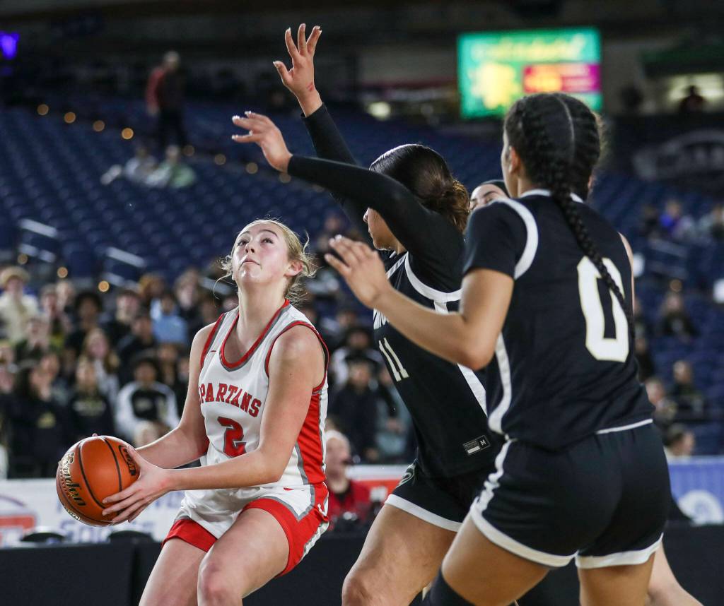 Stanwoods Ellalee Wortham (2) shoots the ball during a 3A girls game in the Hardwood Classic between Lynnwood and Stanwood at the Tacoma Dome in Tacoma, Washington on Wednesday, March 1, 2023. Stanwood won, 74-69. (Annie Barker / The Herald)