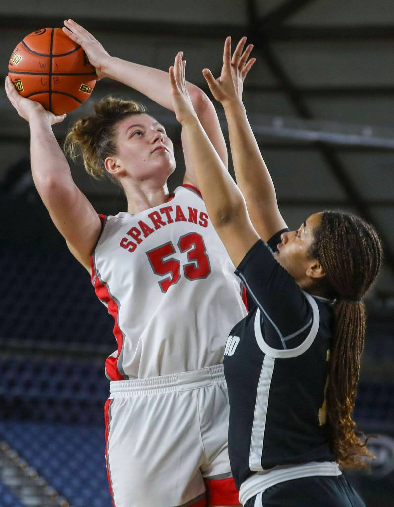 Stanwoods Vivienne Berrett (53) shoots the ball during a 3A girls game in the Hardwood Classic between Lynnwood and Stanwood at the Tacoma Dome in Tacoma, Washington on Wednesday, March 1, 2023. Stanwood won, 74-69.(Annie Barker / The Herald)