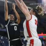 Lynwoods Aniya Hooker (0) shoots the ball during a 3A girls game in the Hardwood Classic between Lynnwood and Stanwood at the Tacoma Dome in Tacoma, Washington on Wednesday, March 1, 2023. Stanwood won, 74-69. (Annie Barker / The Herald)