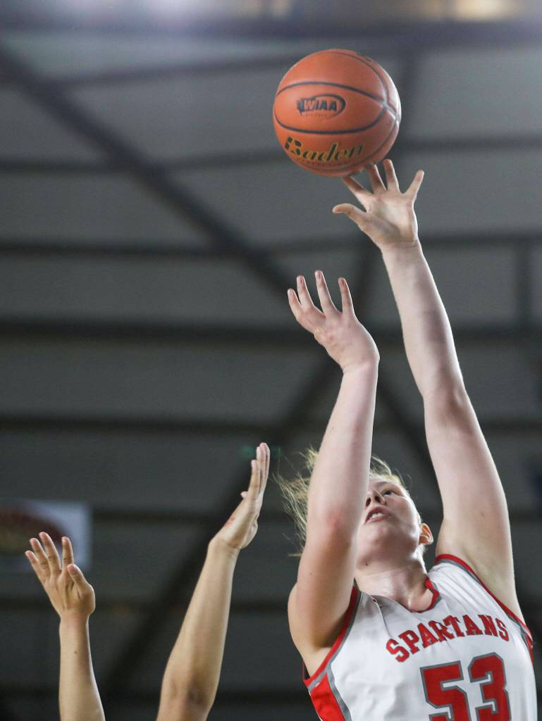 Stanwoods Vivienne Berrett (53) shoots the ball during a 3A girls game in the Hardwood Classic between Lynnwood and Stanwood at the Tacoma Dome in Tacoma, Washington on Wednesday, March 1, 2023. Stanwood won, 74-69. (Annie Barker / The Herald)