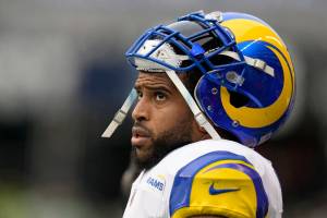 Los Angeles Rams linebacker Bobby Wagner (45) watches play from the sideline during the second half of an NFL football game against the Seattle Seahawks, Sunday, Jan. 8, 2023, in Seattle. (AP Photo/Abbie Parr)