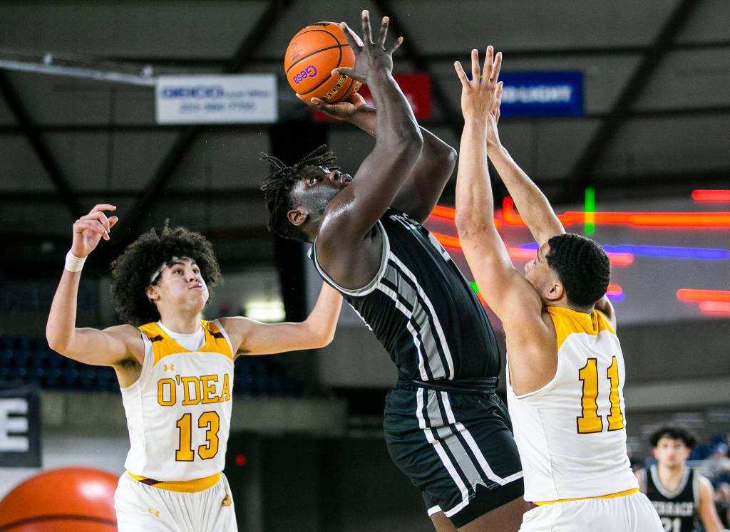 Mountlakes Zaveon Jones attempts a jump shot during the 3A quarterfinal game against ODea on Thursday, March 2, 2023 in Tacoma, Washington. (Olivia Vanni / The Herald)