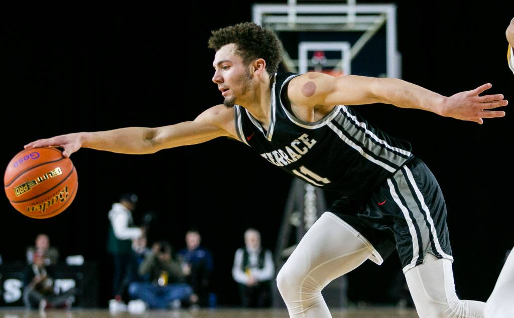 Mountlakes Chris Meegan reaches out to catch the ball during the 3A quarterfinal game against ODea on Thursday, March 2, 2023 in Tacoma, Washington. (Olivia Vanni / The Herald)