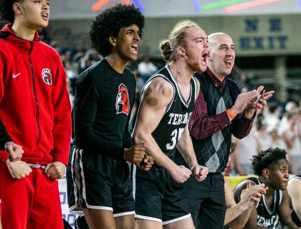 The Mountlake bench reacts to a score during the 3A quarterfinal game against ODea on Thursday, March 2, 2023 in Tacoma, Washington. (Olivia Vanni / The Herald)