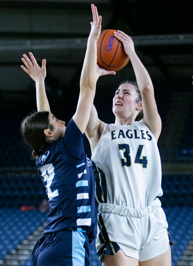 Arlingtons Jenna Villa makes a jump shot during the 3A quarterfinal game against Meadowdale on Thursday, March 2, 2023 in Tacoma, Washington. (Olivia Vanni / The Herald)