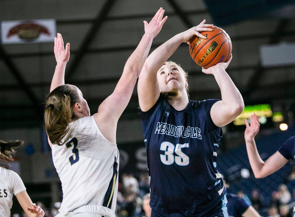 Meadowdales Audrey Lucas attempts a layup during the 3A quarterfinal game against Arlington on Thursday, March 2, 2023 in Tacoma, Washington. (Olivia Vanni / The Herald)