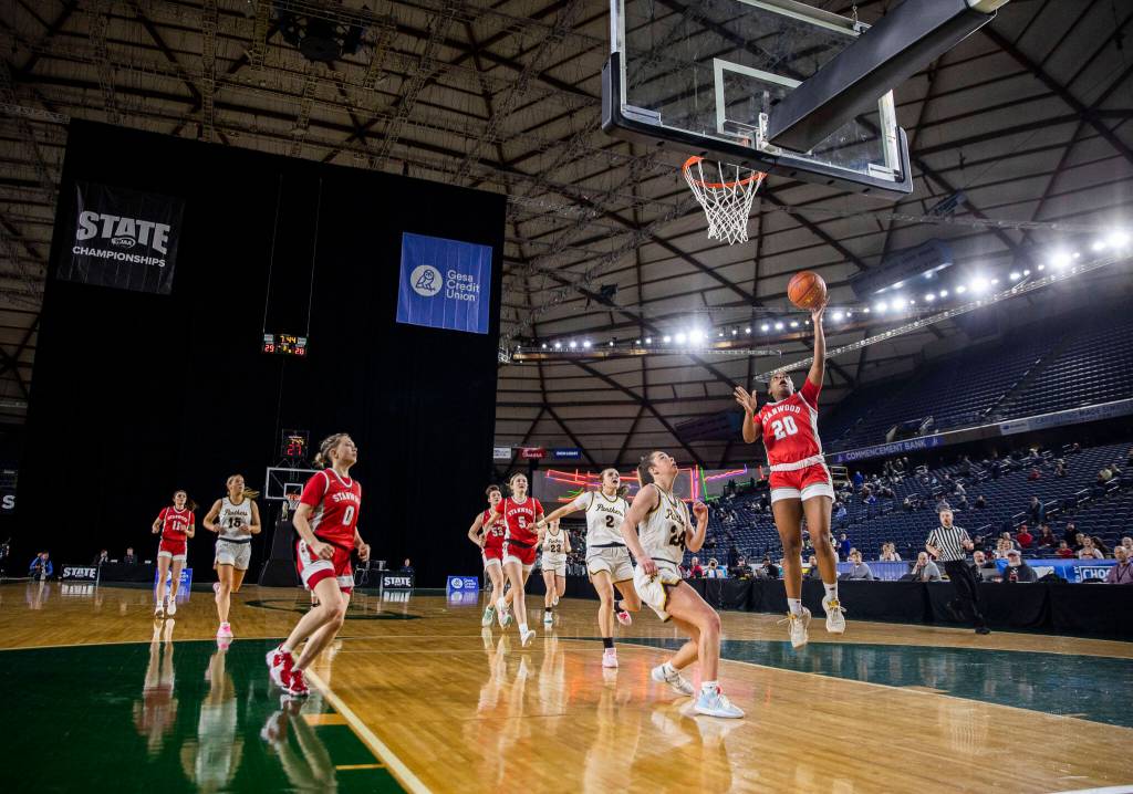 Stanwoods Chloe Santeford makes a open layup during the 3A quarterfinal game against Mead on Thursday, March 2, 2023 in Tacoma, Washington. (Olivia Vanni / The Herald)