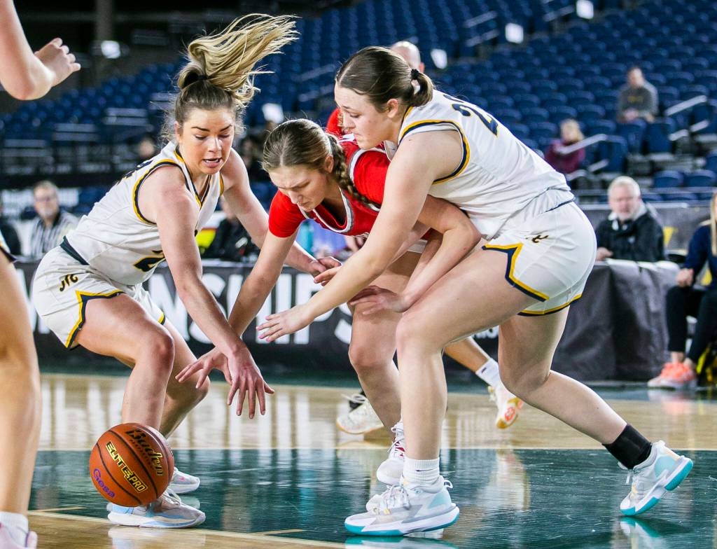 Stanwoods Ava Depew scrambles for the ball during the 3A quarterfinal game against Mead on Thursday, March 2, 2023 in Tacoma, Washington. (Olivia Vanni / The Herald)