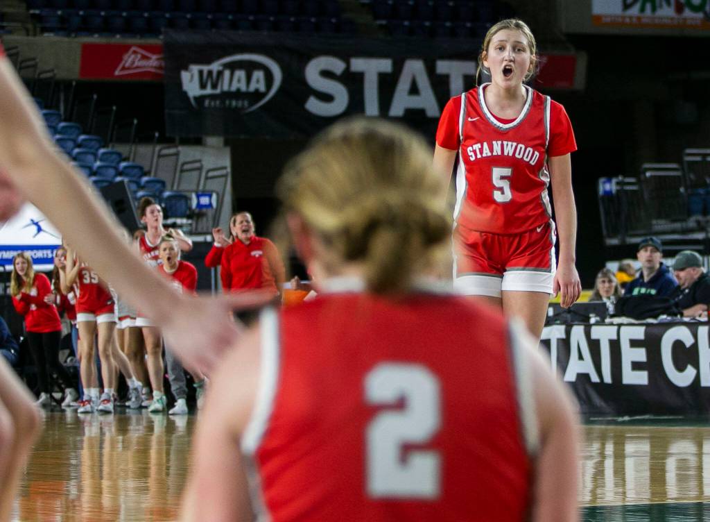Stanwoods Ava Depew reacts to teammate Ellalee Wortham drawing a foul during the 3A quarterfinal game against Mead on Thursday, March 2, 2023 in Tacoma, Washington. (Olivia Vanni / The Herald)